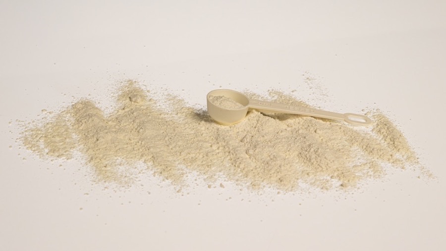 Powdered collagen with a scoop, illustrating the Verisol® raw material